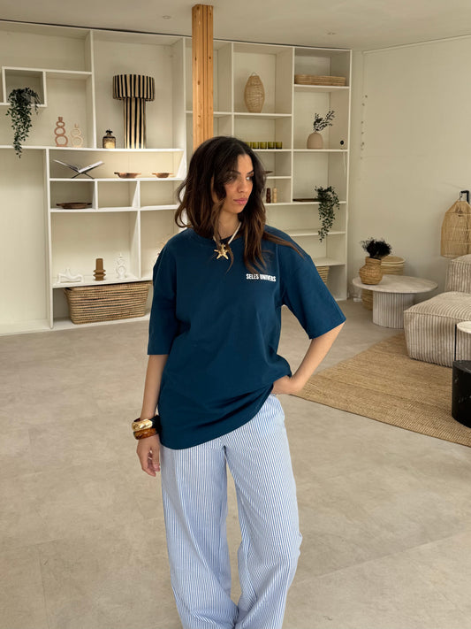 Pantalon rayé bleu et blanc brodé