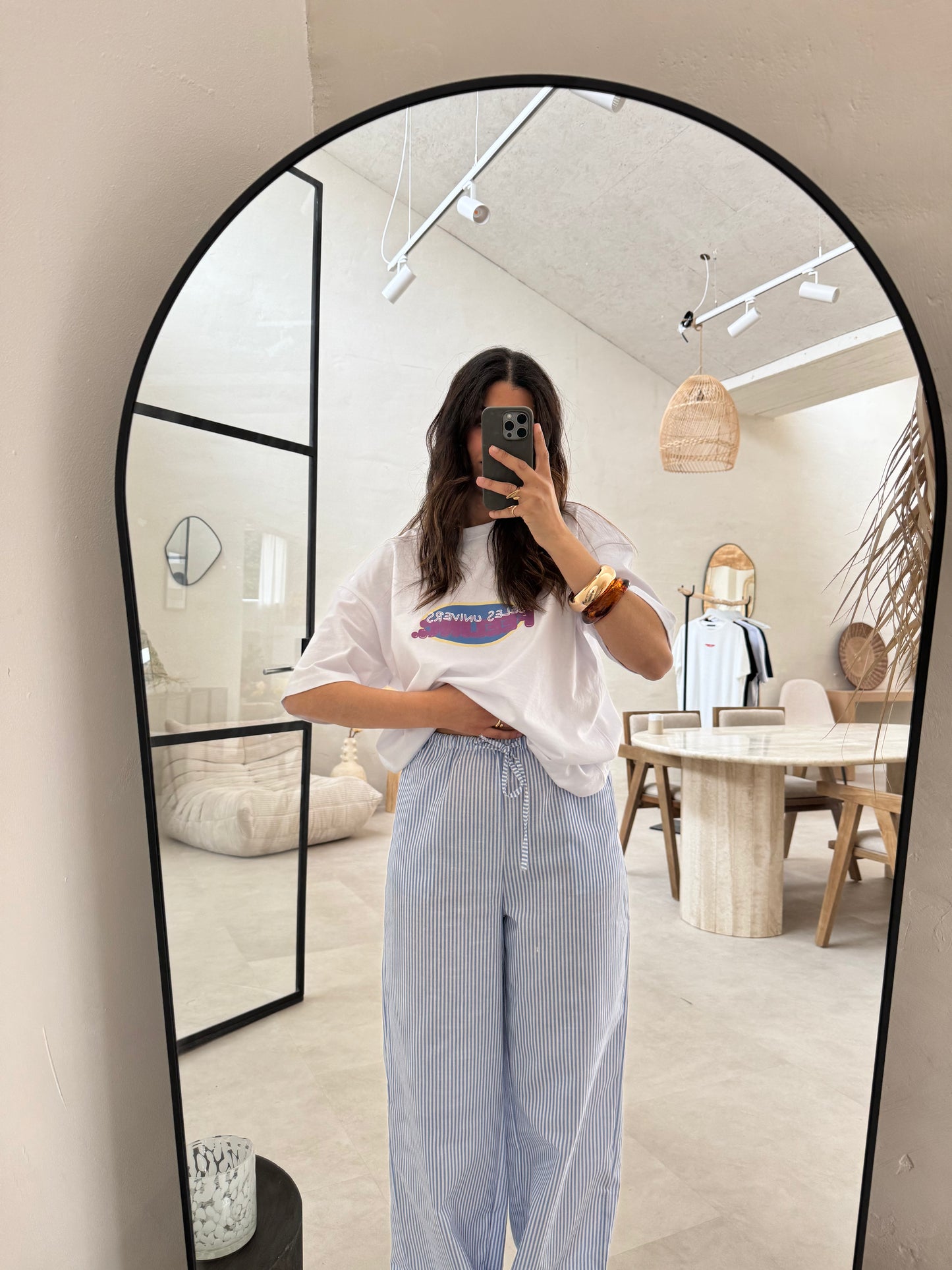 Pantalon rayé bleu et blanc brodé
