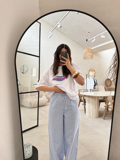 Pantalon rayé bleu et blanc brodé